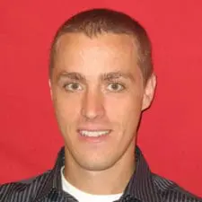 Headshot of Carlin Brickner, the Director of Analytics at the Business Intelligence and Analytics Department and a Researcher at the Center for Home Care Policy & Research at the VNS Health.