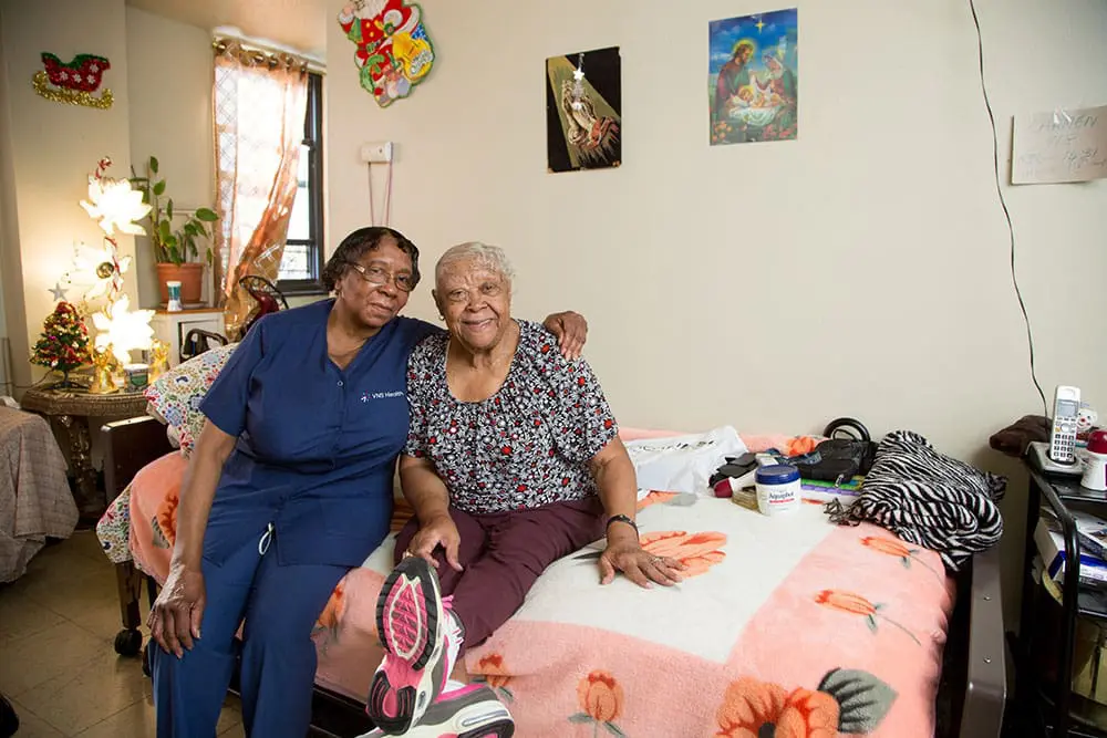 VNS Health home health aide Geraldine with her elderly patient.