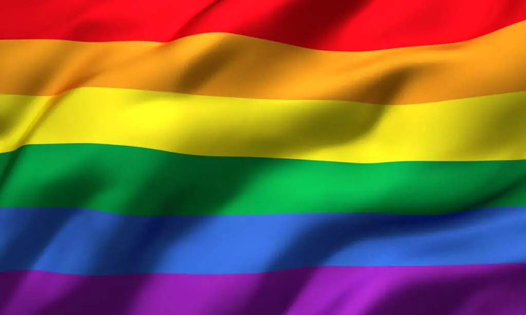 pride flag blowing in the wind