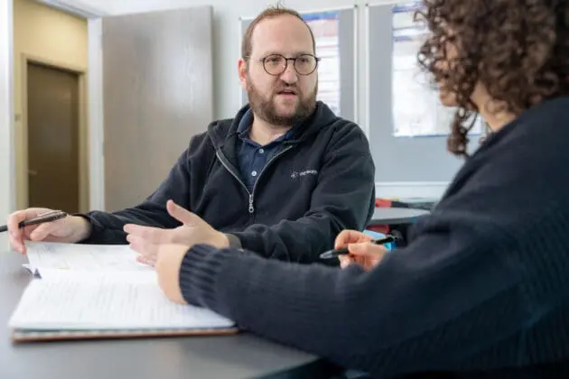 VNS Health team member talking with patient about hospice care.
