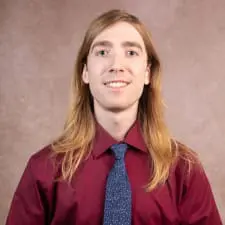Headshot of VNS Health Research Assistant Ian Spens.