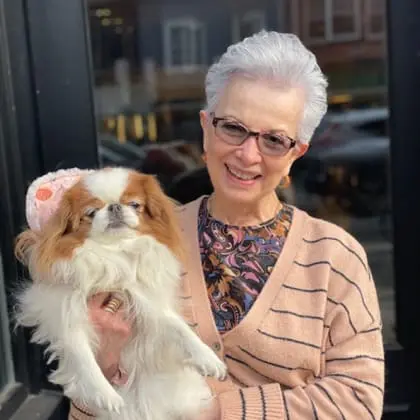 Headshot of Liz and her dog Stella, VNS Health Hospice Volunteers.