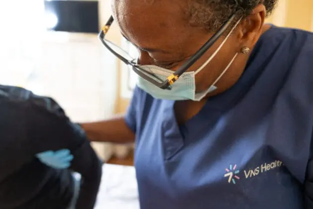 VNS Health home health aide caring for hospice patient