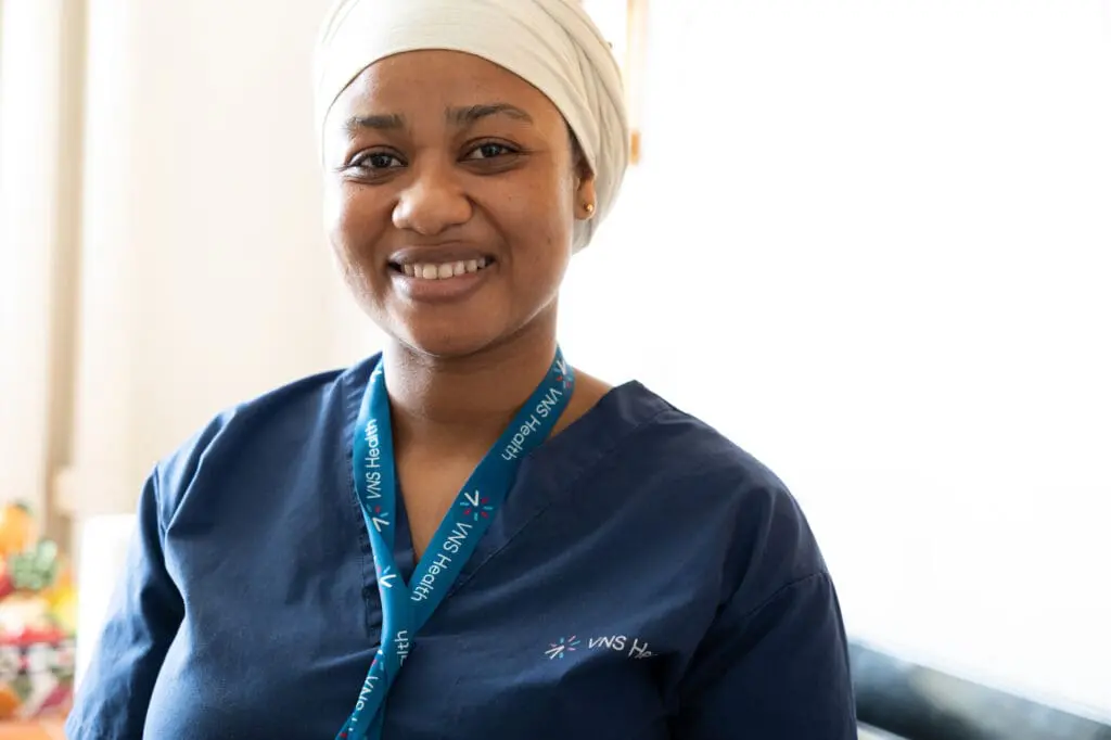 VNS Health home health aide smiling