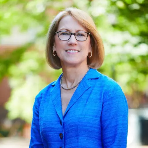photo of dr Kathy Bowles outside and smiling