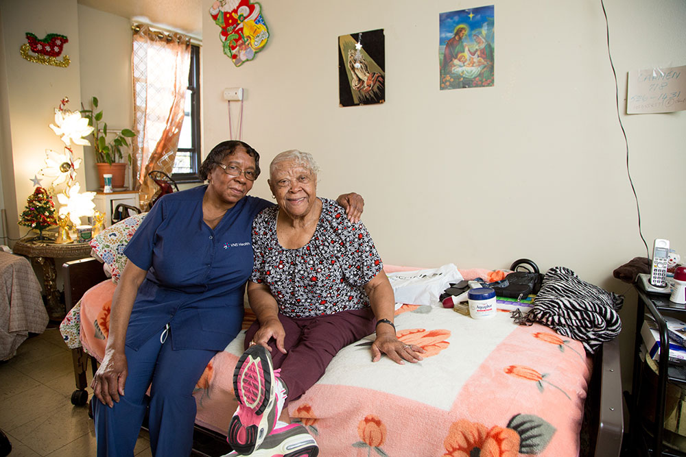 home health aid with elderly woman