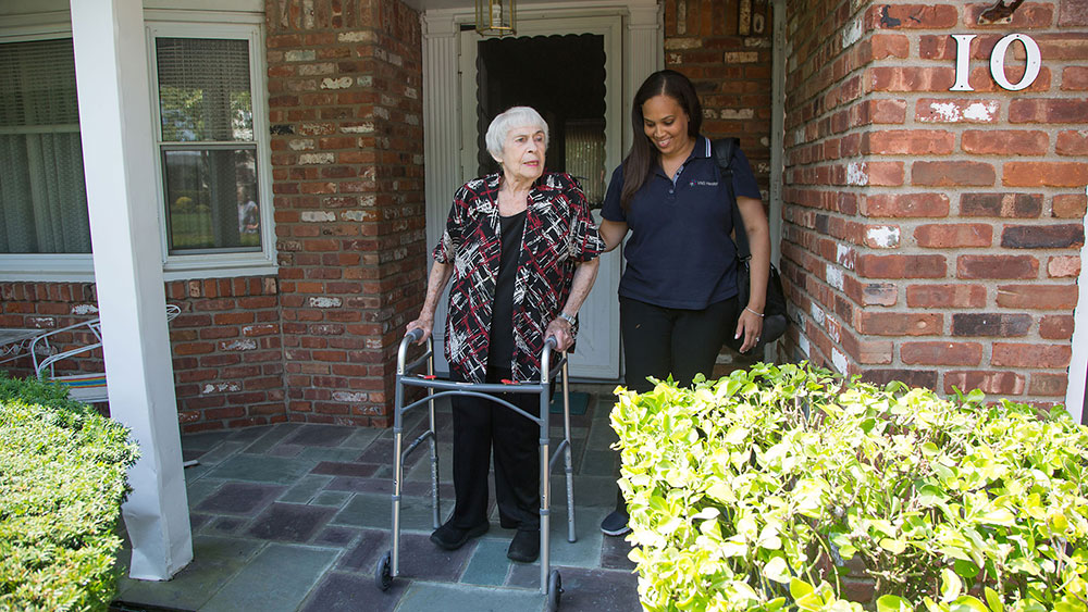 home health care aid with elderly woman