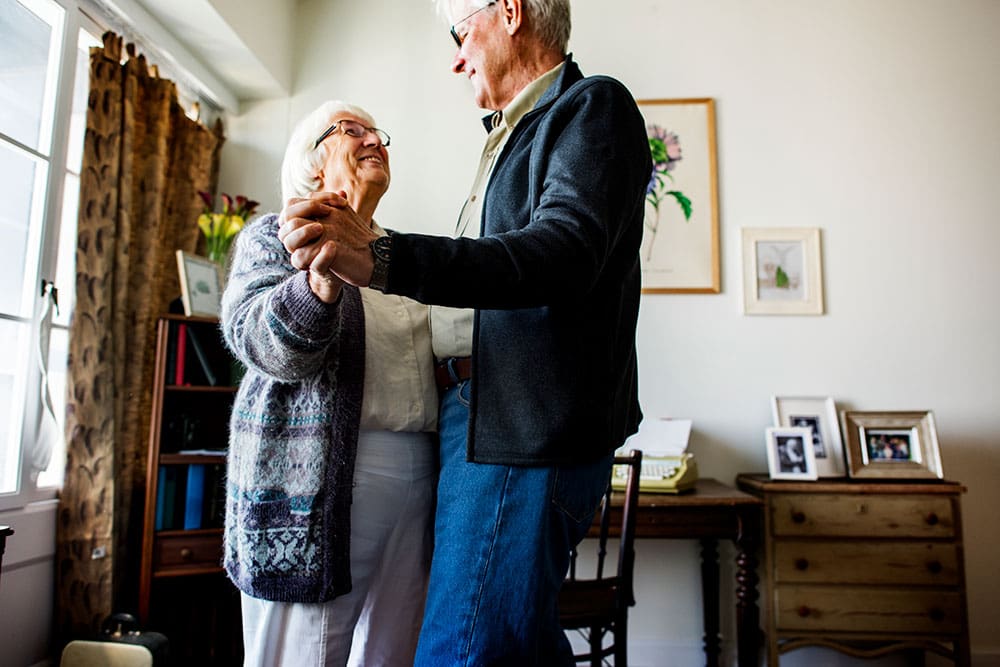 elderly couple dancing