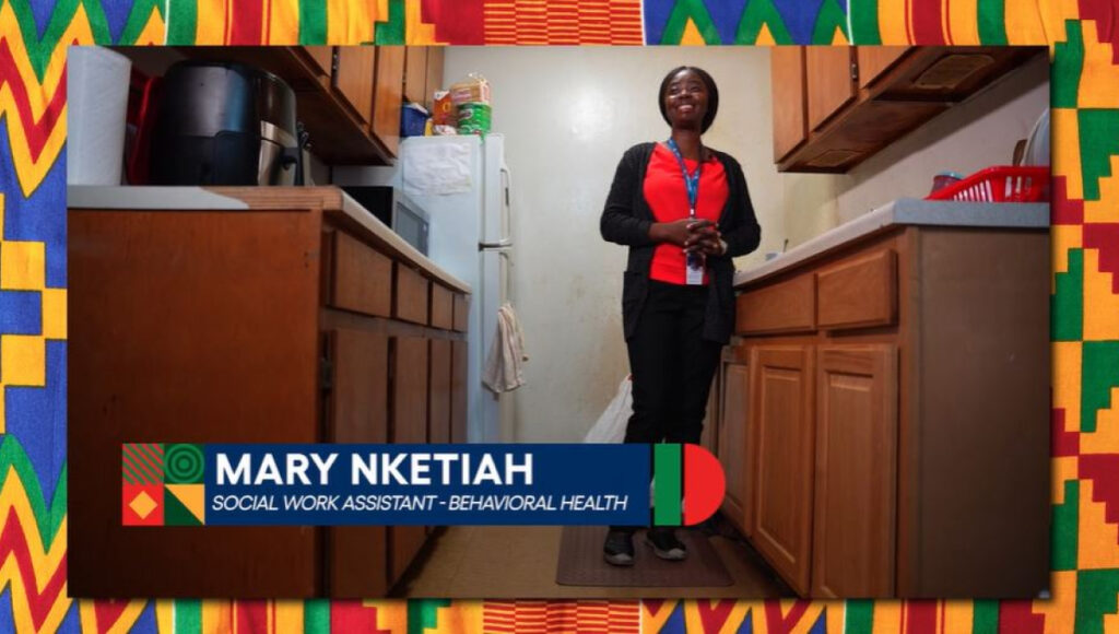 vns health team member mary nketiah stands in kitchen talking to camera