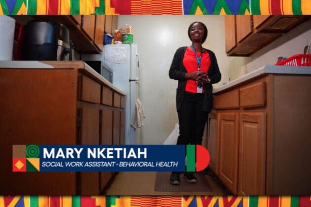 vns health team member mary nketiah stands in kitchen talking to camera