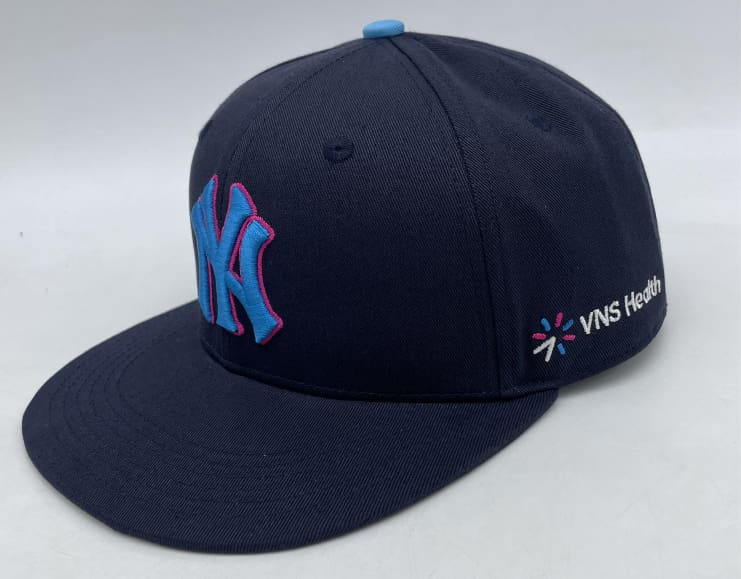 a yankees hat with the vns health logo stitched on the side