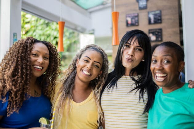 group photo of diverse youth smiling