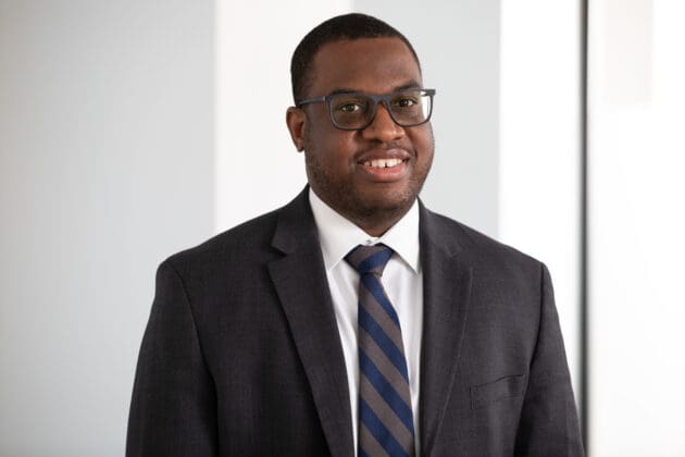 Photo of EVP and CFO Keith Patterson wearing a black suit